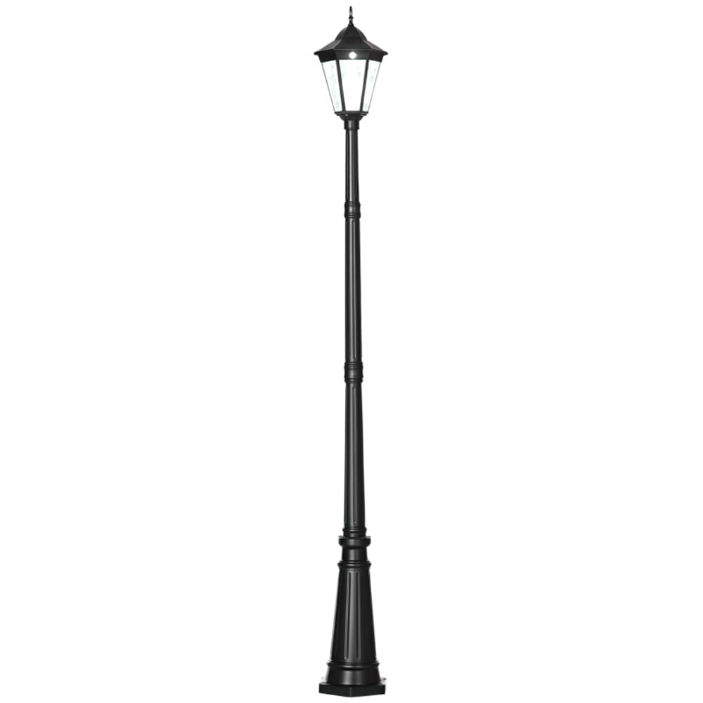Black outdoor lamp post on a white background