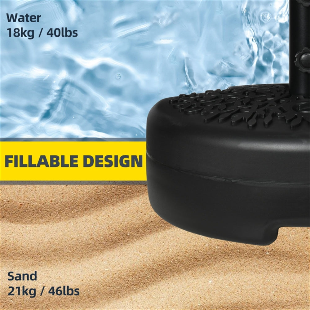 Black sand or water container with text indicating weight capacity on water and sand, against a beach background.