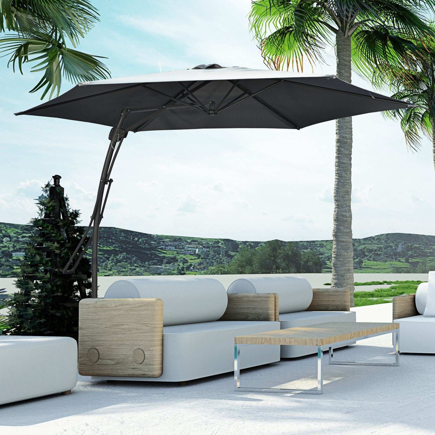 Outdoor patio set with a large black umbrella, white cushions, and wooden accents under palm trees.