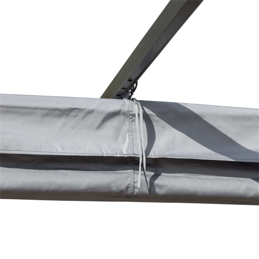 Close-up of a grey canopy with a zipper on a white background