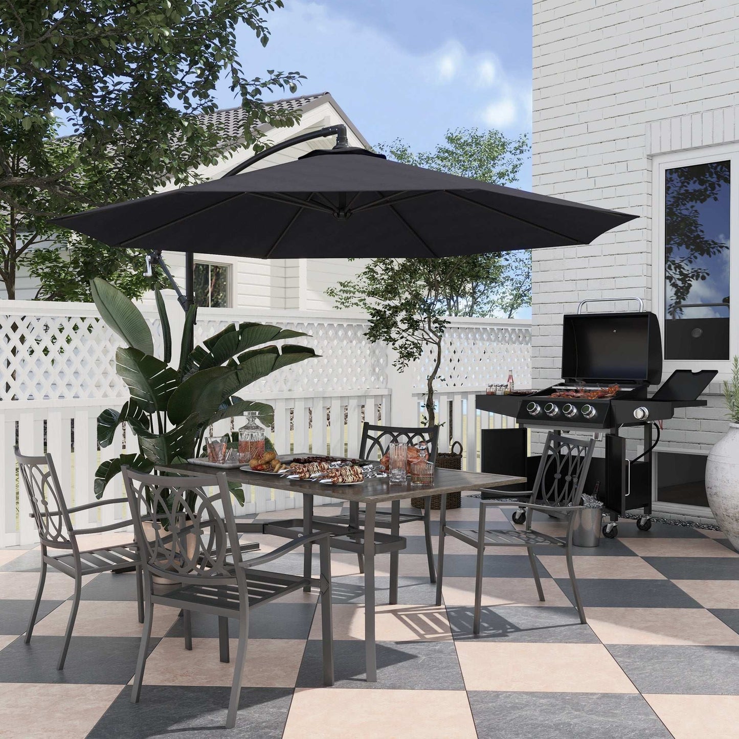 Outdoor patio set with table, chairs, and umbrella on a checkered patio floor.