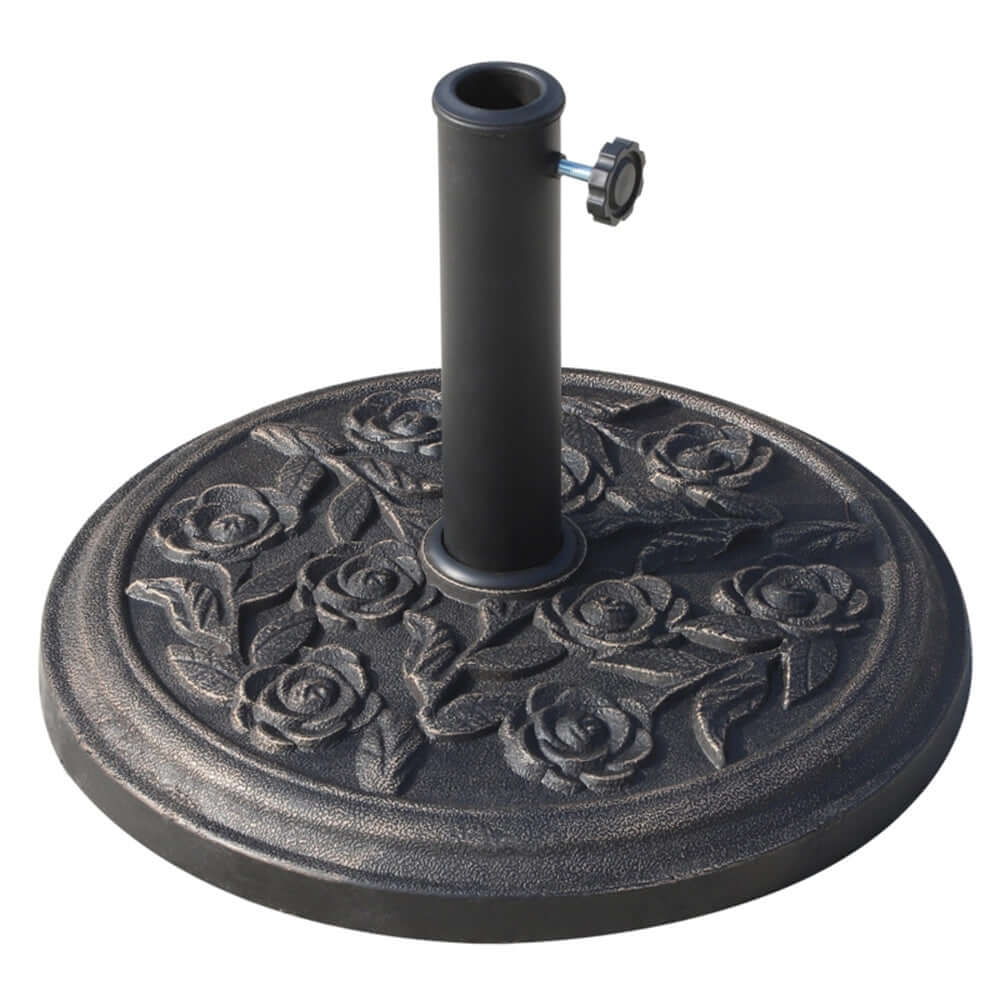 Decorative black metal umbrella base with rose pattern on a white background