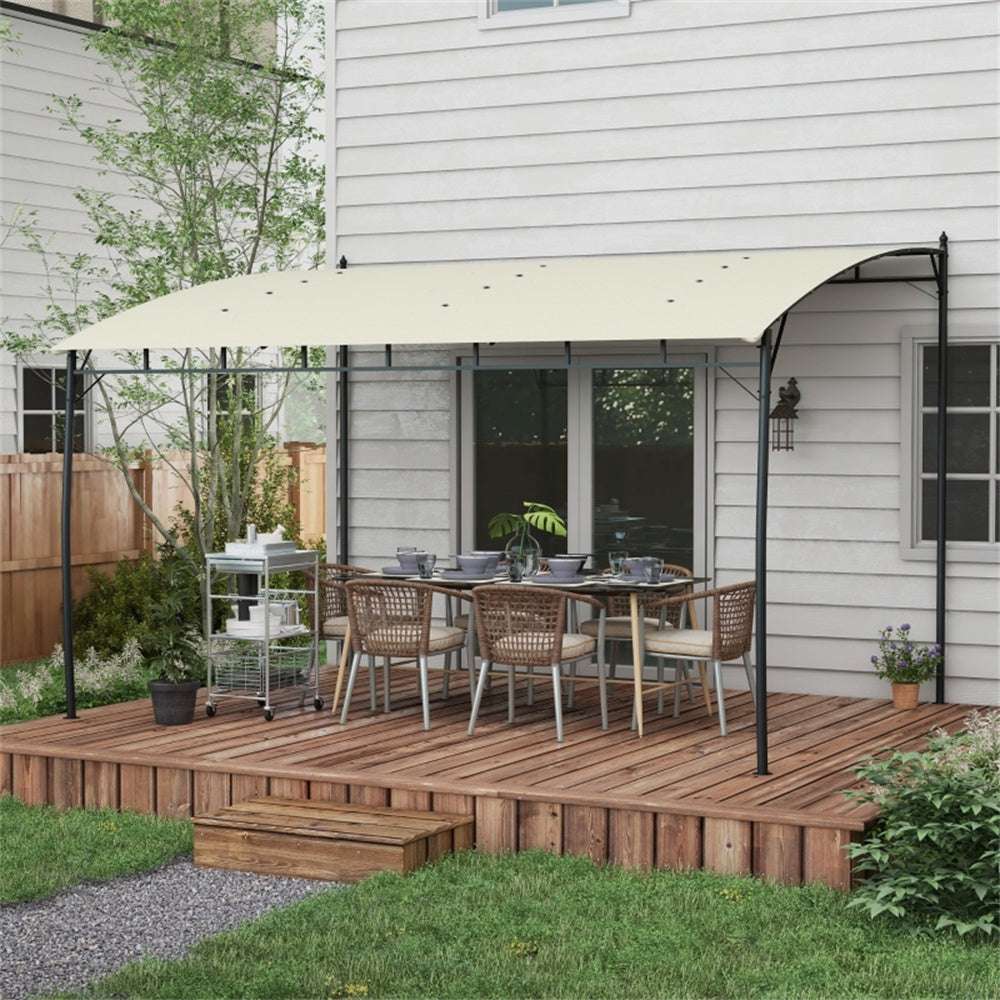 Outdoor patio setup with a table, chairs, and umbrella on a wooden deck.