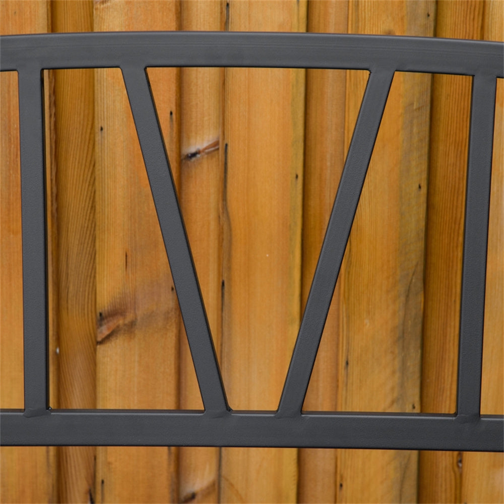 Metal railing with wooden fence background