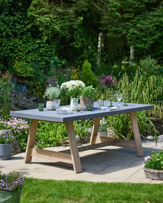 Grey outdoor garden table with wooden legs 