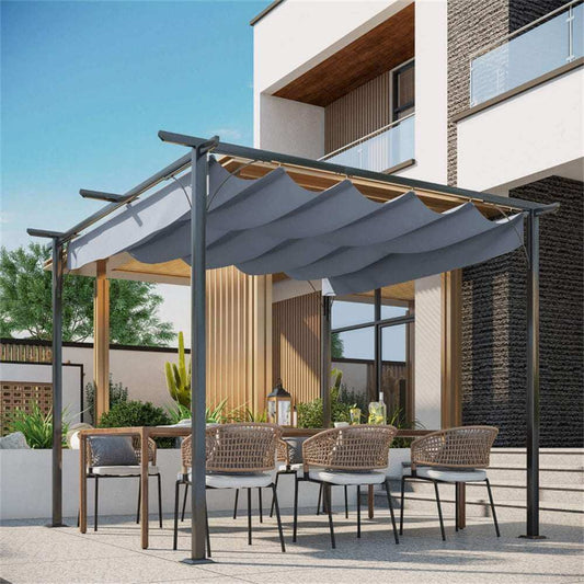 Garden patio with pergola, table, and chairs in front of a modern building.
