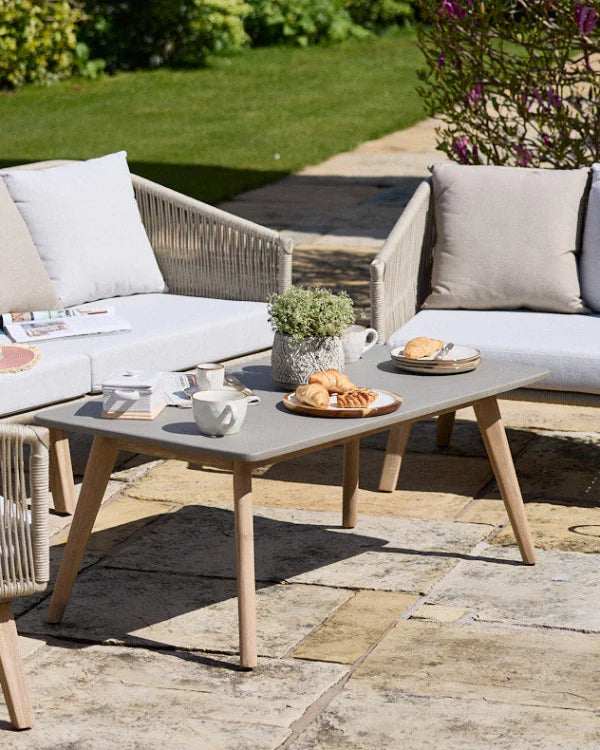 Luxury outdoor patio set with table, 2 seater sofa 2 chairs, and cushions