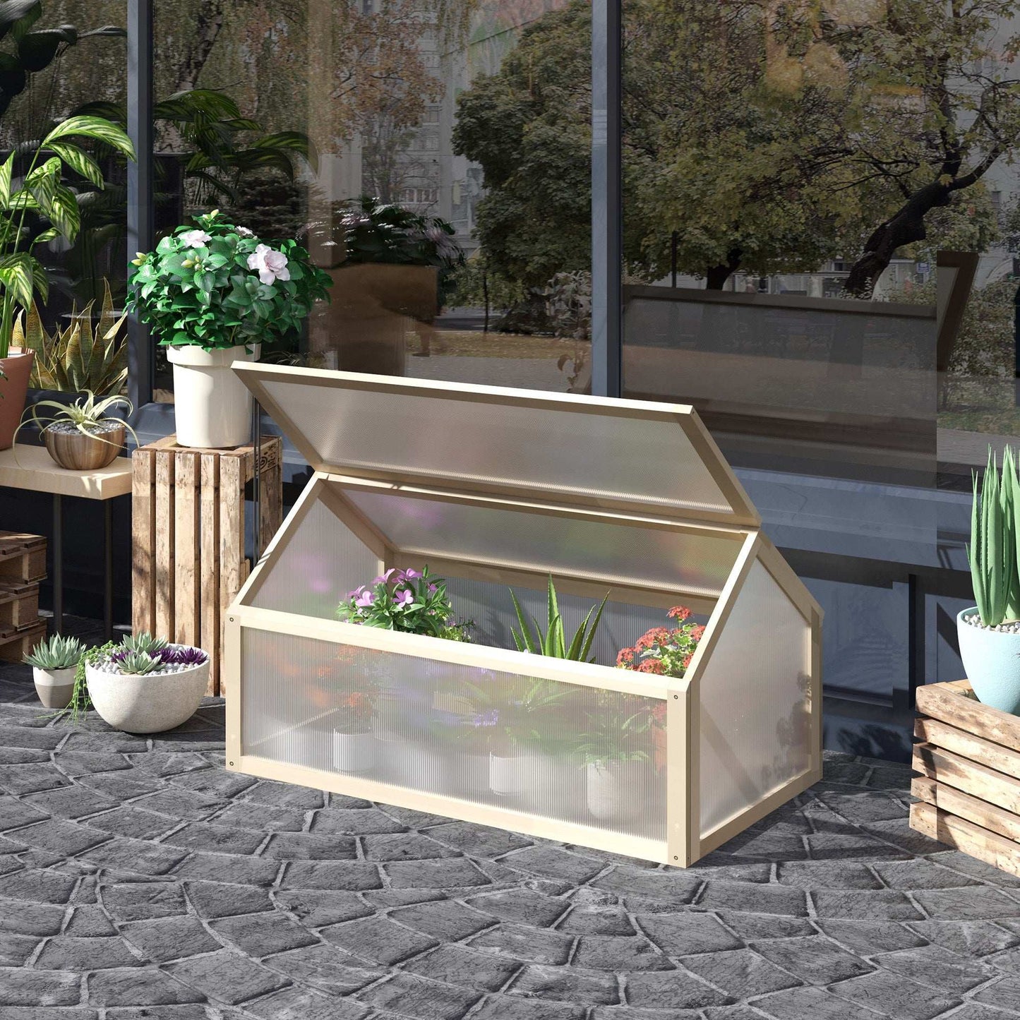 Small wooden greenhouse with plants on a stone patio