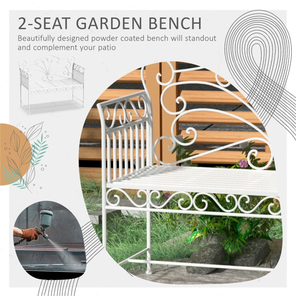 White garden bench with decorative metalwork on a patio setting