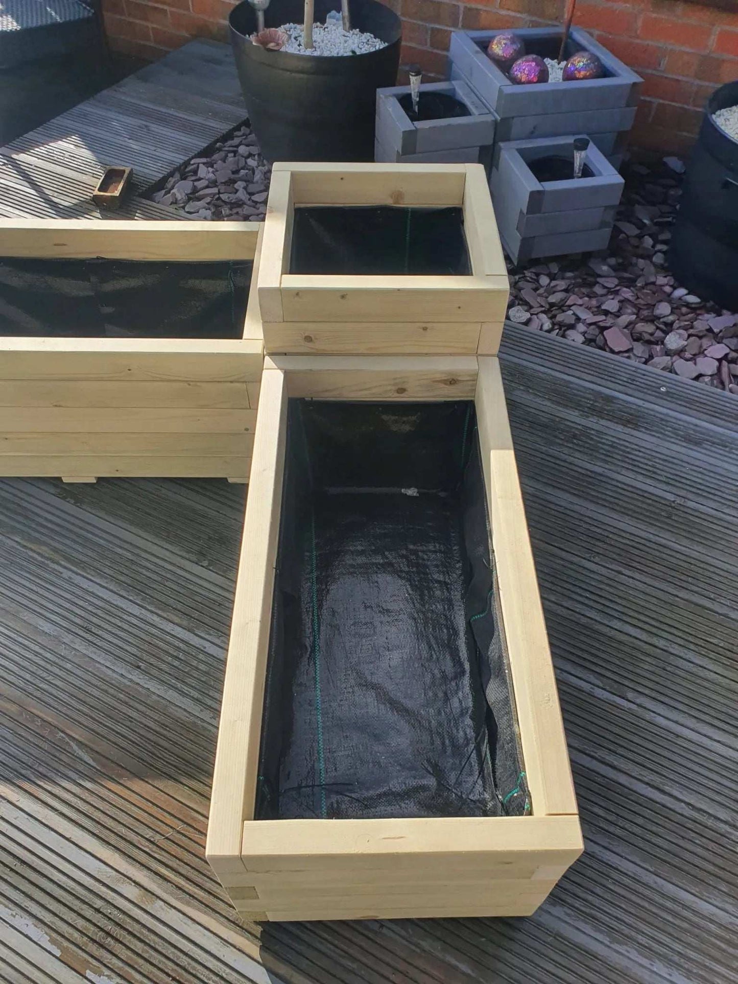 right side of Large Corner Wooden Treated Garden Planter
