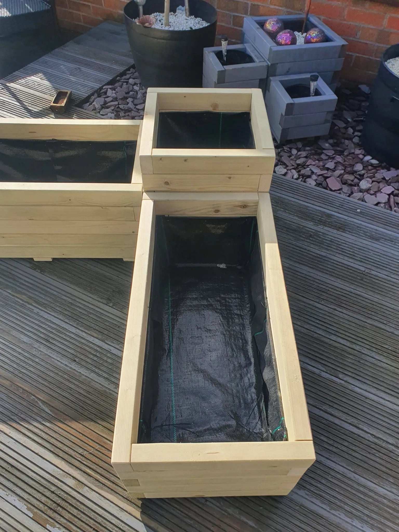 right side of Large Corner Wooden Treated Garden Planter